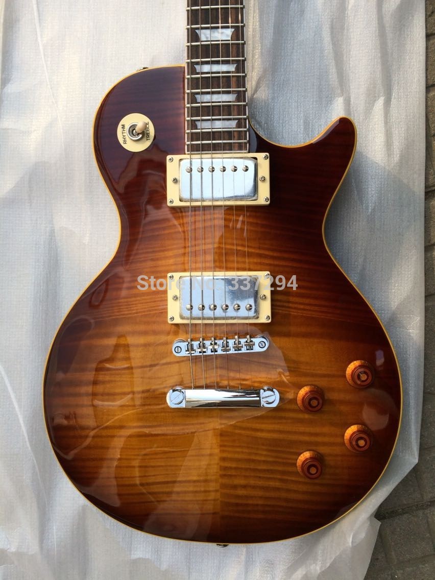 Free shipping Standard Upgrade Models Guitar Tiger Flame Maple Top Tea Sunburst Brown Electric Guitar Yellow Binding Chibson Guitar
Free shipping Standard Upgrade Models Guitar Tiger Flame Maple Top Tea Sunburst Brown Electric Guitar Yellow Binding Chibson Guitar