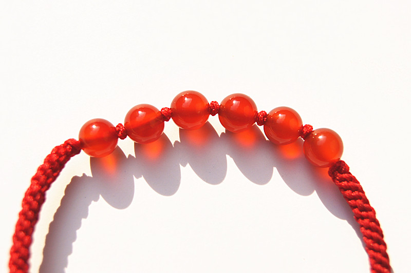 Hand catenary, pure manual weaving red knot + Hong Kong garden red agate beads bracelet.