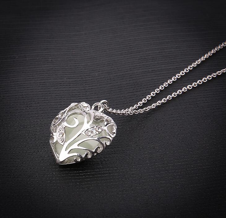 Free shipping 2017 new hollow luminous heart-shaped necklace luminous pendant female WFN149 (with chain) mix order 20 pieces a lot