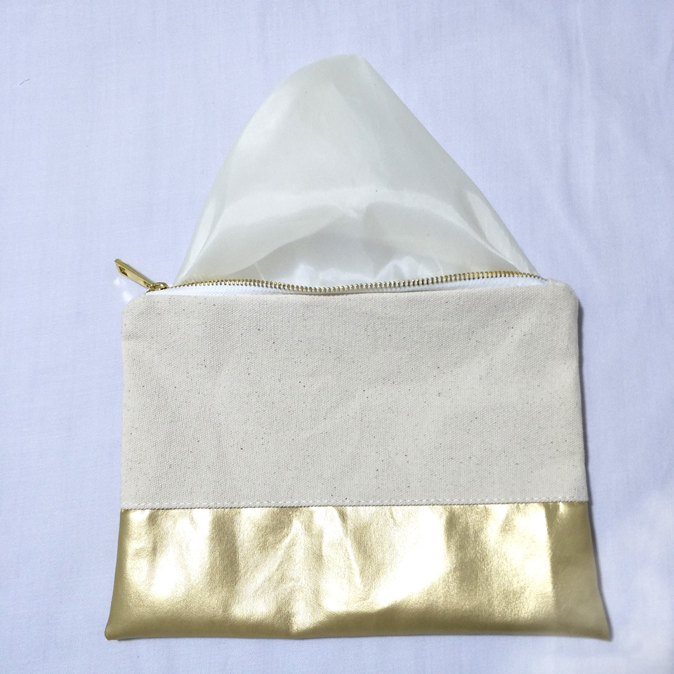 natural cotton canvas cosmetic bag with waterproof gold leather bottom matching color lining gold zip 7x10in makeup bag factory