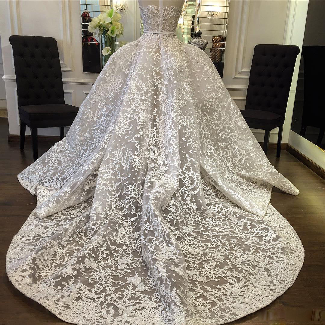 Stunning See Through Wedding Dresses With Detachable Train Sheer Neckline Sequined Lace Appliques Wedding Gowns Gorgeous A Line Bridal Dress