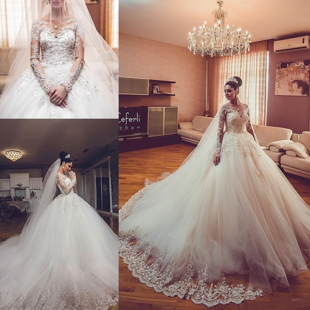 New Modern Sexy Arabic Long Sleeves A Line Wedding Dresses Illusion Lace Appliques Crystal Beaded Tulle Plus Size Formal Bridal Gowns