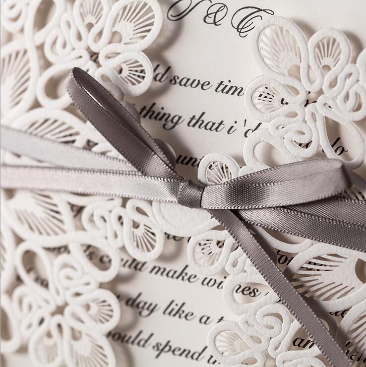 high-grade Wedding Invitation Cards Laser Cut Customizable Hollow Crystal Lace Bow Ribbon paper material free shipping WT01