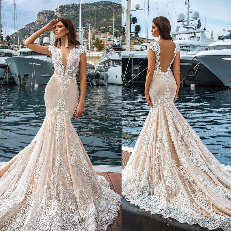 New Crystal Design Plunging V-neck Mermaid Wedding Dresses Illusion Backless Cap Sleeves Lace Appliques Sexy Vestios Do Novia Bridal Gowns, Same as image
New Crystal Design Plunging V-neck Mermaid Wedding Dresses Illusion Backless Cap Sleeves Lace Appliques Sexy Vestios Do Novia Bridal Gowns, Same as image
