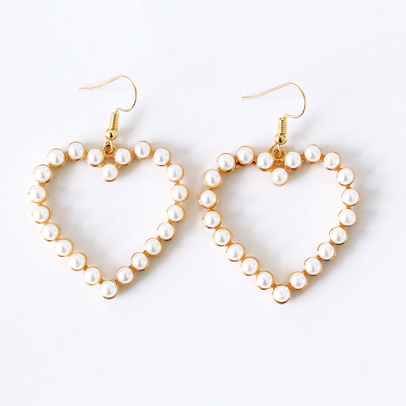 New Fashion Vintage Lovely Hearts Pearl Charm Earrings Sweet Trendy OL Style Hollow Heart Drop Earrings For Women Jewelry
New Fashion Vintage Lovely Hearts Pearl Charm Earrings Sweet Trendy OL Style Hollow Heart Drop Earrings For Women Jewelry