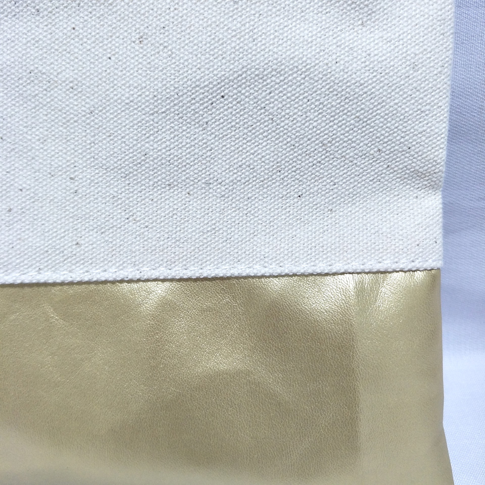 natural cotton canvas cosmetic bag with waterproof gold leather bottom matching color lining gold zip 7x10in makeup bag factory