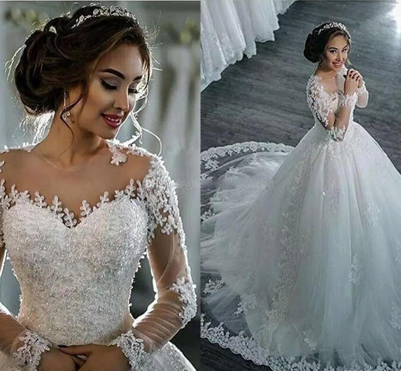 Arabic Long Sleeve Lace Ball Gown Wedding dresses Sheer Neck Wedding Gowns With Beads Covered Button Luxury Bridal Gowns, Black
Arabic Long Sleeve Lace Ball Gown Wedding dresses Sheer Neck Wedding Gowns With Beads Covered Button Luxury Bridal Gowns, Black