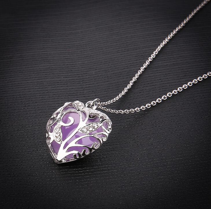 Free shipping 2017 new hollow luminous heart-shaped necklace luminous pendant female WFN149 (with chain) mix order 20 pieces a lot