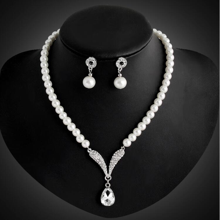 Bride Wedding Jewelry Silver Plated Tear Drop Pearl Rhinestone Crystal Bridal Necklace Studs Earrings Jewelry Set Women Party Jewelry Gift
Bride Wedding Jewelry Silver Plated Tear Drop Pearl Rhinestone Crystal Bridal Necklace Studs Earrings Jewelry Set Women Party Jewelry Gift