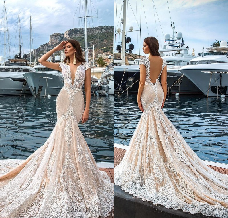 2017 Gorgeous Full Lace Mermaid Wedding Dresses Deep V neck Capped Sleeves Court Train Beach Bridal Gowns Sheer Back Vestidos De Noiva, Champagne 
2017 Gorgeous Full Lace Mermaid Wedding Dresses Deep V neck Capped Sleeves Court Train Beach Bridal Gowns Sheer Back Vestidos De Noiva, Champagne