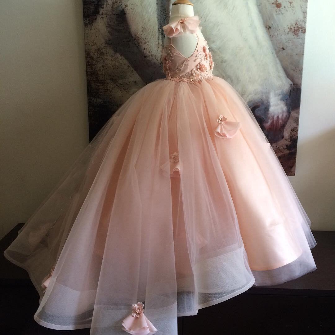 Elegant Pink Tulle Flower Girl Ball Gown with Detailed Beading and Handmade Floral Accents