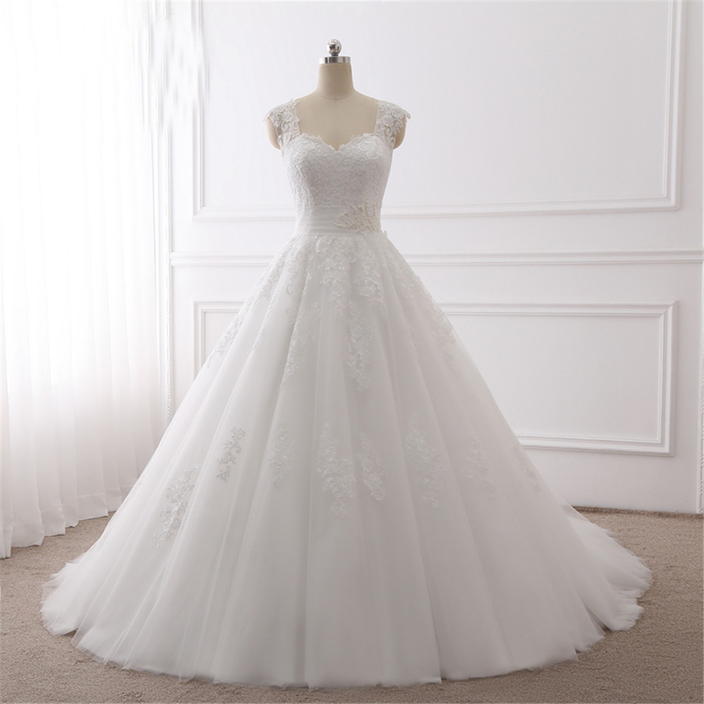 Sweetheart Cap Sleeves Ball Gown Wedding Dresses Pearls Lace Appliques Bridal Gowns Vestido De Novias Princess Luxury Cathedral Train, White 
Sweetheart Cap Sleeves Ball Gown Wedding Dresses Pearls Lace Appliques Bridal Gowns Vestido De Novias Princess Luxury Cathedral Train, White