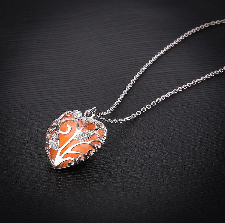 Free shipping 2017 new hollow luminous heart-shaped necklace luminous pendant female WFN149 (with chain) mix order 20 pieces a lot