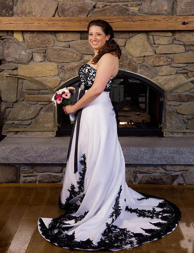 Plus Size White and Black Wedding Dresses A Line Applique Lace Sexy Back Strapless Bridal Gowns
Plus Size White and Black Wedding Dresses A Line Applique Lace Sexy Back Strapless Bridal Gowns