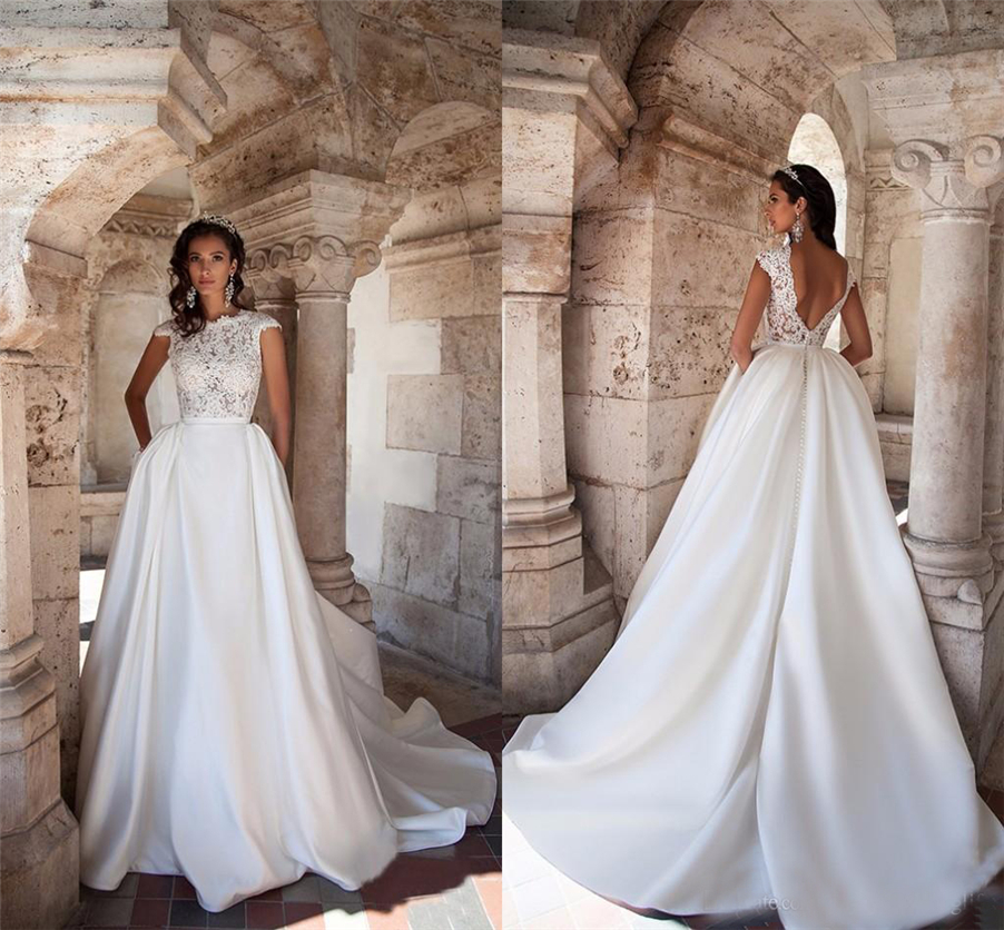 Sexy Backless Bridal Gowns Long Train With Pockets Wedding Gowns New Cap Sleeves Lace Top Satin Wedding Dresses
Sexy Backless Bridal Gowns Long Train With Pockets Wedding Gowns New Cap Sleeves Lace Top Satin Wedding Dresses