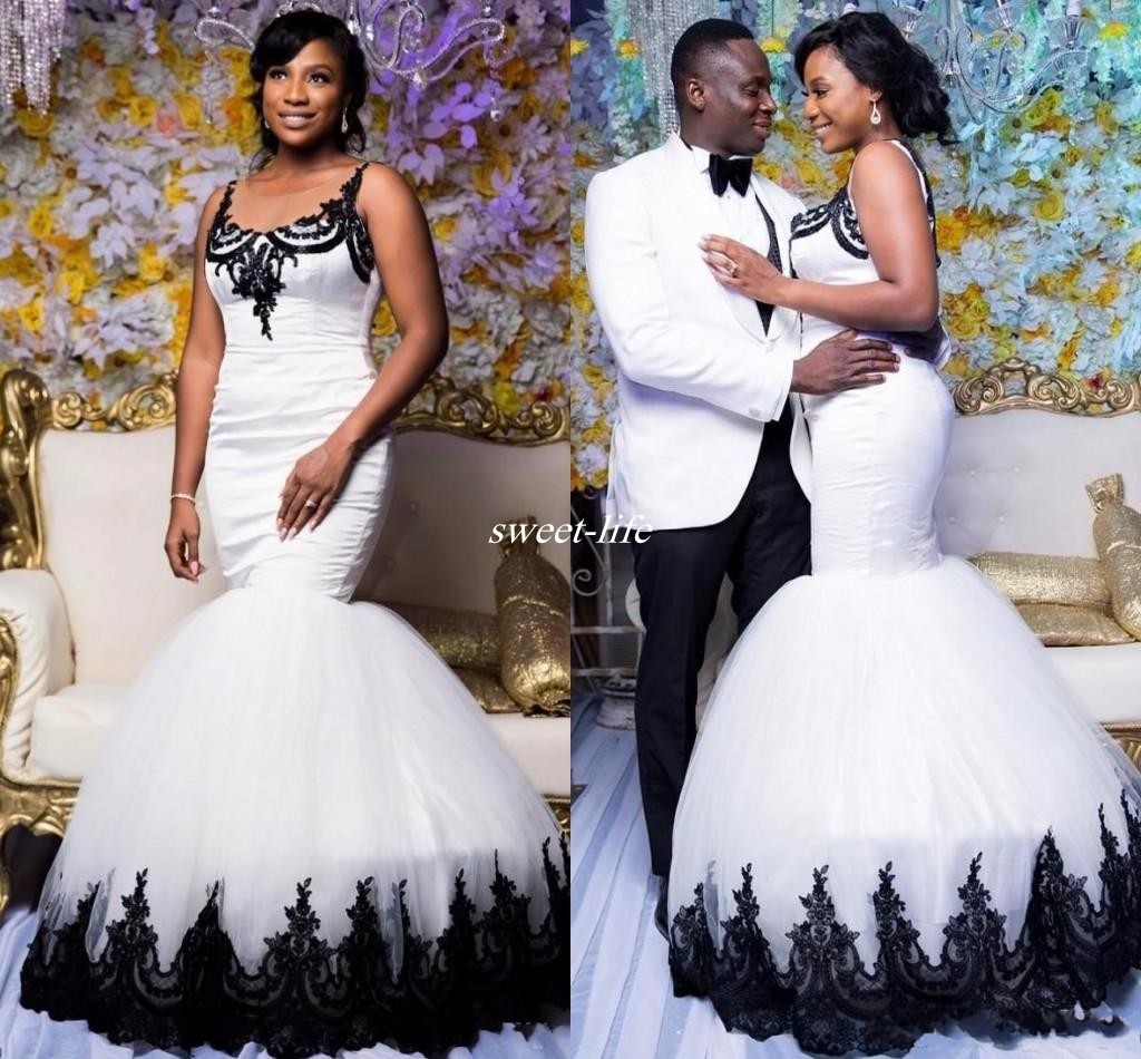 African Trumpet White Long Wedding Dresses With Black Appliques Lace Tank Sheer Scoop Neck Mermaid Bridal Gowns Custom Made Marriage Dress, Ivory
African Trumpet White Long Wedding Dresses With Black Appliques Lace Tank Sheer Scoop Neck Mermaid Bridal Gowns Custom Made Marriage Dress, Ivory