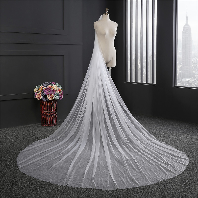 Stock 3 Meters Long Tulle Wedding Veil with Comb 1T Cut Edge Bridal Veil Wedding Accessories 2017 CPA078, White 
Stock 3 Meters Long Tulle Wedding Veil with Comb 1T Cut Edge Bridal Veil Wedding Accessories 2017 CPA078, White