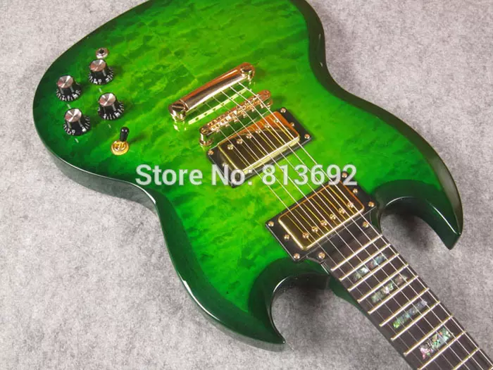 Custom Limited Trans Green Qulited Mape Top SG Double Cutaway Electric Guitar Different Towards Pickups installed Trapezoid Abalone Inlay
Custom Limited Trans Green Qulited Mape Top SG Double Cutaway Electric Guitar Different Towards Pickups installed Trapezoid Abalone Inlay