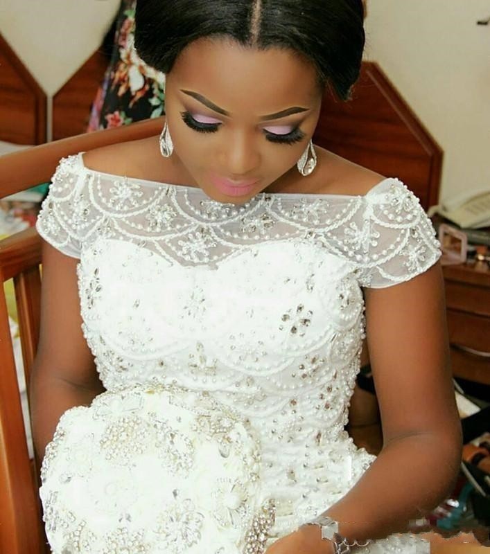 Saudi Arabic Plus Size Mermaid Wedding Dresses 2017 Beading Pearls Sheer Bateau Neck Ruffled Wedding Gowns Short Sleeves Bridal Dress