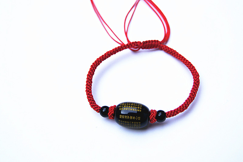 Pure manual weaving carved black - red agate jackfruit heart sutra bracelet.