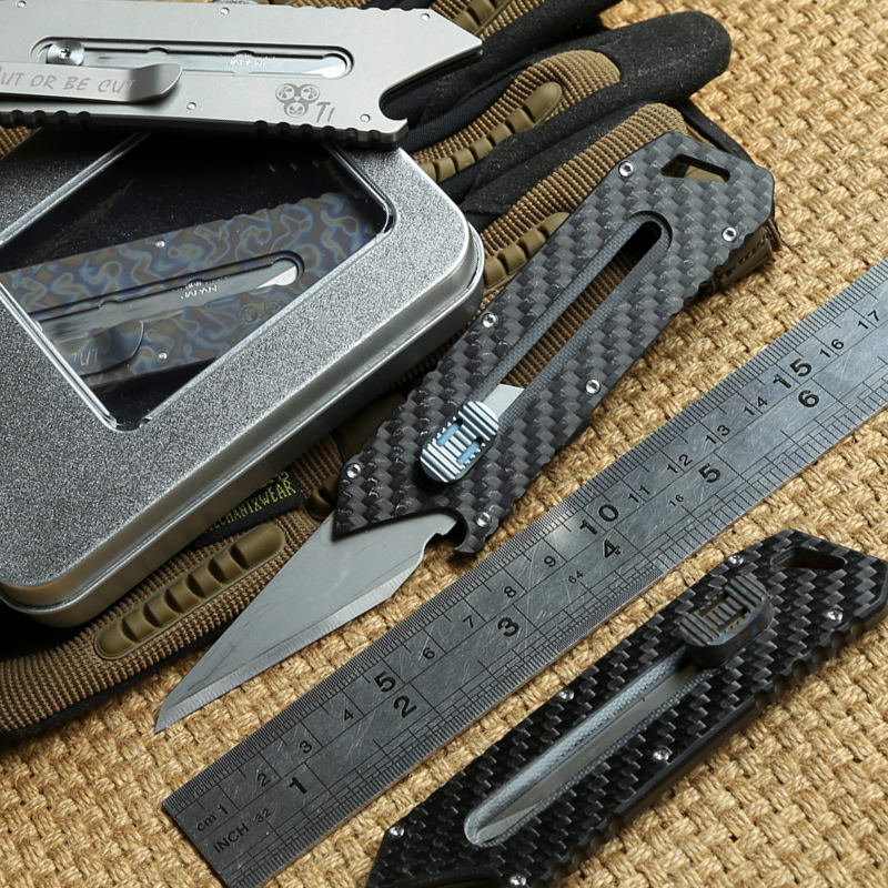 MG Original Paper cutter Cutting knife Titanium G10 Handle Olfa stainless steel blade Pruning pocket outdoor camping knife knives EDC tool
MG Original Paper cutter Cutting knife Titanium G10 Handle Olfa stainless steel blade Pruning pocket outdoor camping knife knives EDC tool