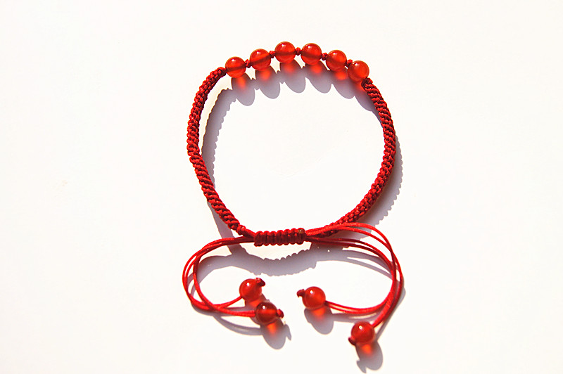 Hand catenary, pure manual weaving red knot + Hong Kong garden red agate beads bracelet.