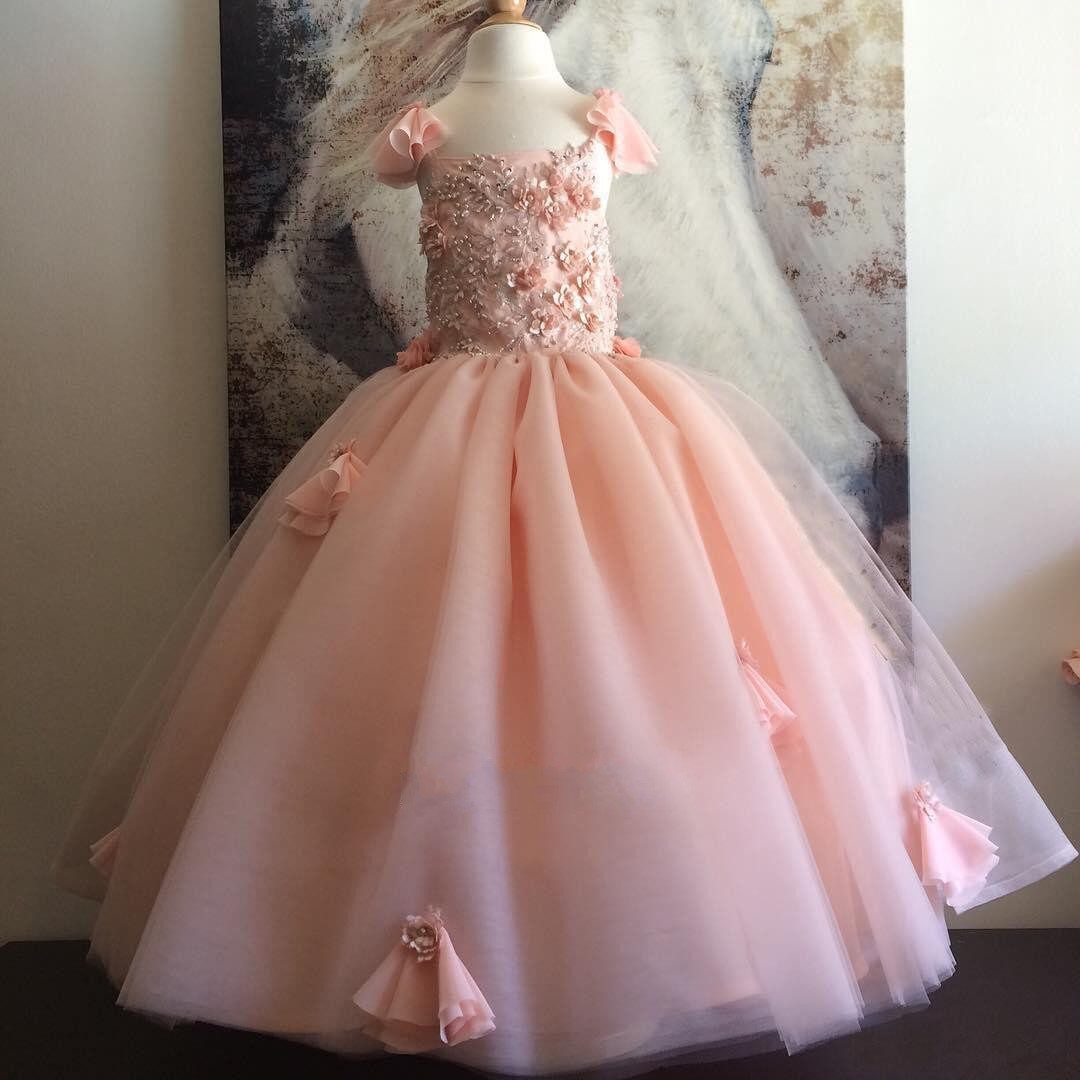 Elegant Pink Tulle Flower Girl Ball Gown with Detailed Beading and Handmade Floral Accents