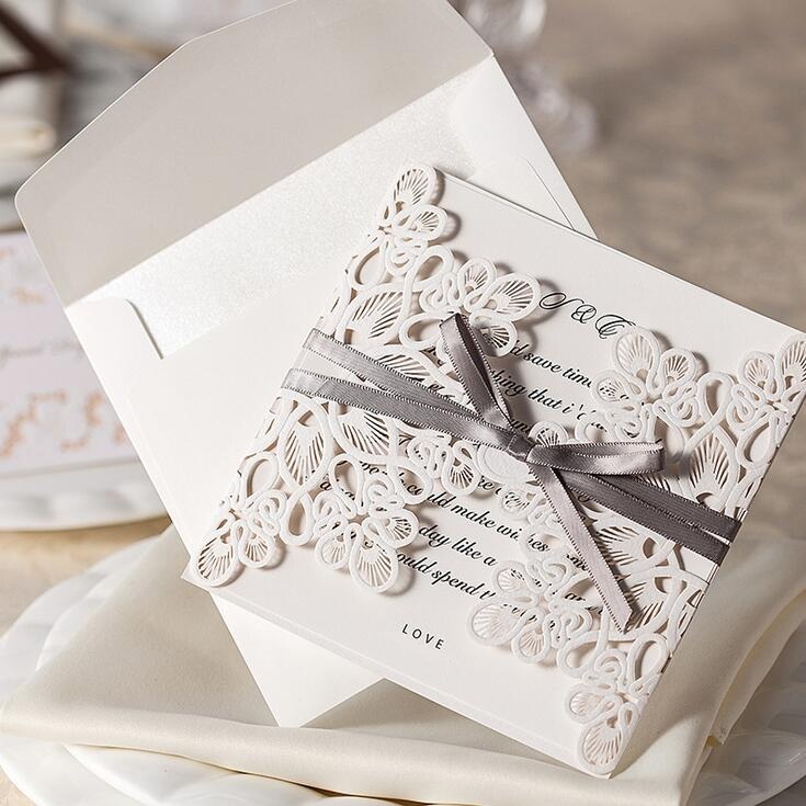 high-grade Wedding Invitation Cards Laser Cut Customizable Hollow Crystal Lace Bow Ribbon paper material free shipping WT01