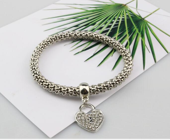 Alloy jewelry three - color stretch diamond love heart lock bracelet European and American women 's fast sell through three - piece