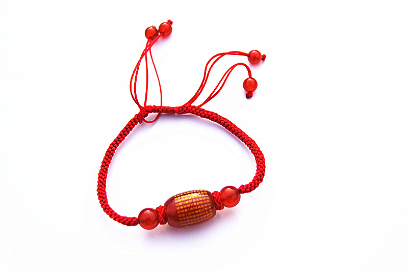 Pure manual weaving carved black - red agate jackfruit heart sutra bracelet.