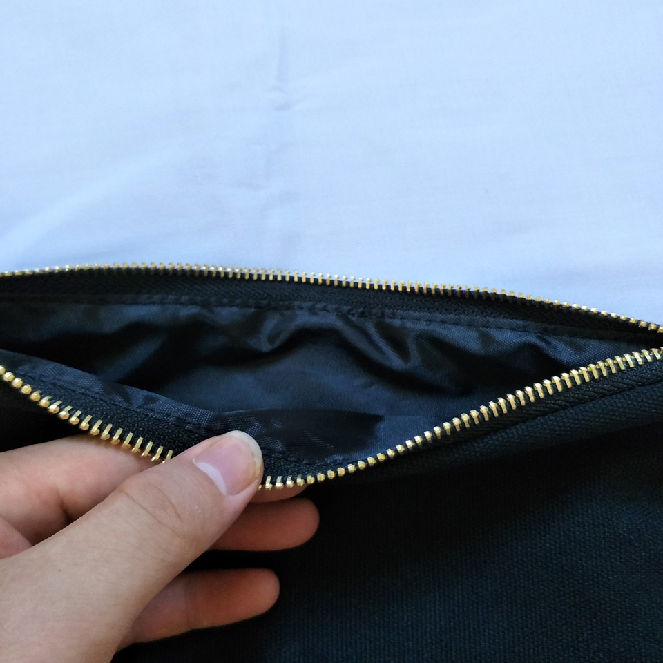 natural cotton canvas cosmetic bag with waterproof gold leather bottom matching color lining gold zip 7x10in makeup bag factory
