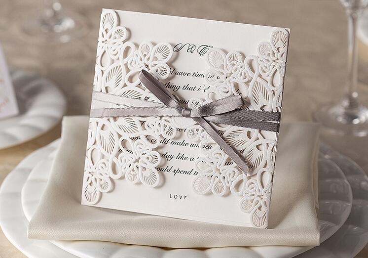 high-grade Wedding Invitation Cards Laser Cut Customizable Hollow Crystal Lace Bow Ribbon paper material free shipping WT01