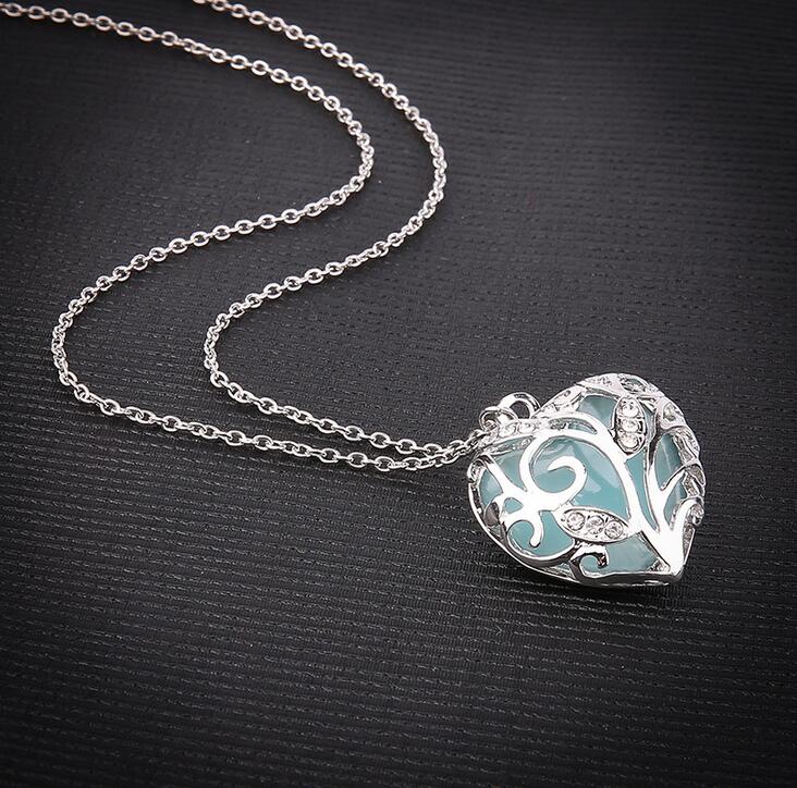 Free shipping 2017 new hollow luminous heart-shaped necklace luminous pendant female WFN149 (with chain) mix order 20 pieces a lot