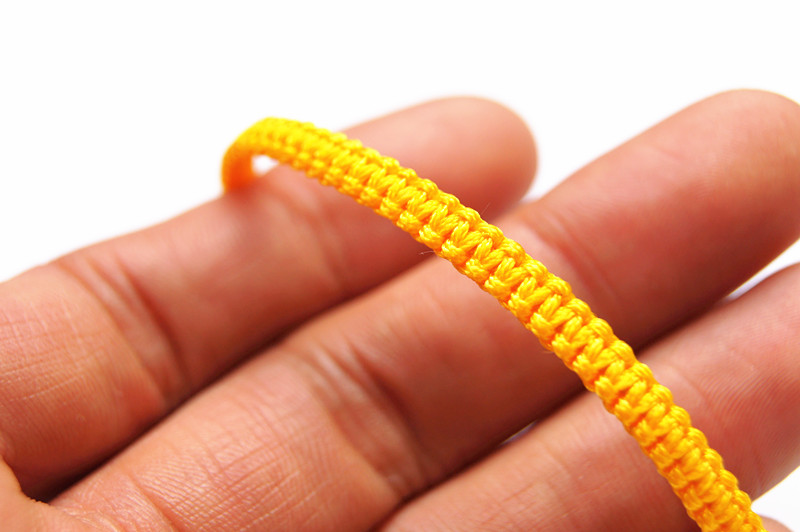 Free delivery - pure hand woven yellow * red * dark green, flat knot - charm bracelet.