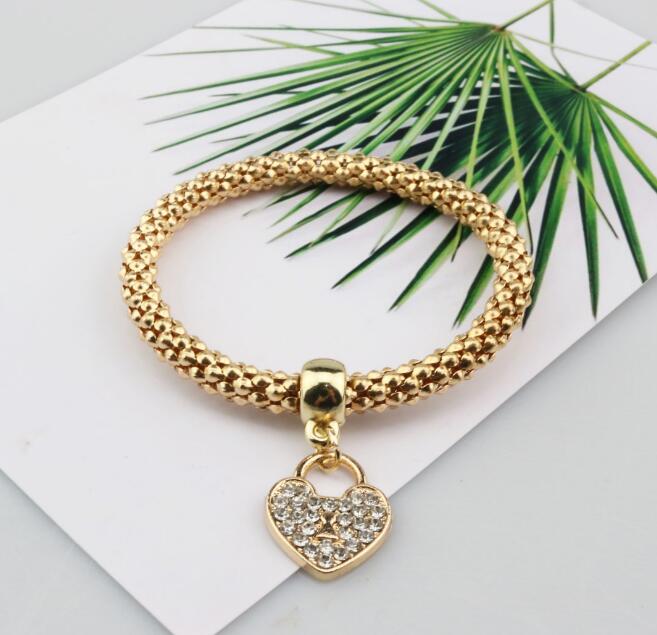 Alloy jewelry three - color stretch diamond love heart lock bracelet European and American women 's fast sell through three - piece