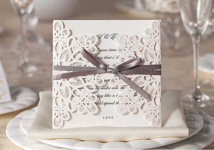 high-grade Wedding Invitation Cards Laser Cut Customizable Hollow Crystal Lace Bow Ribbon paper material free shipping WT01