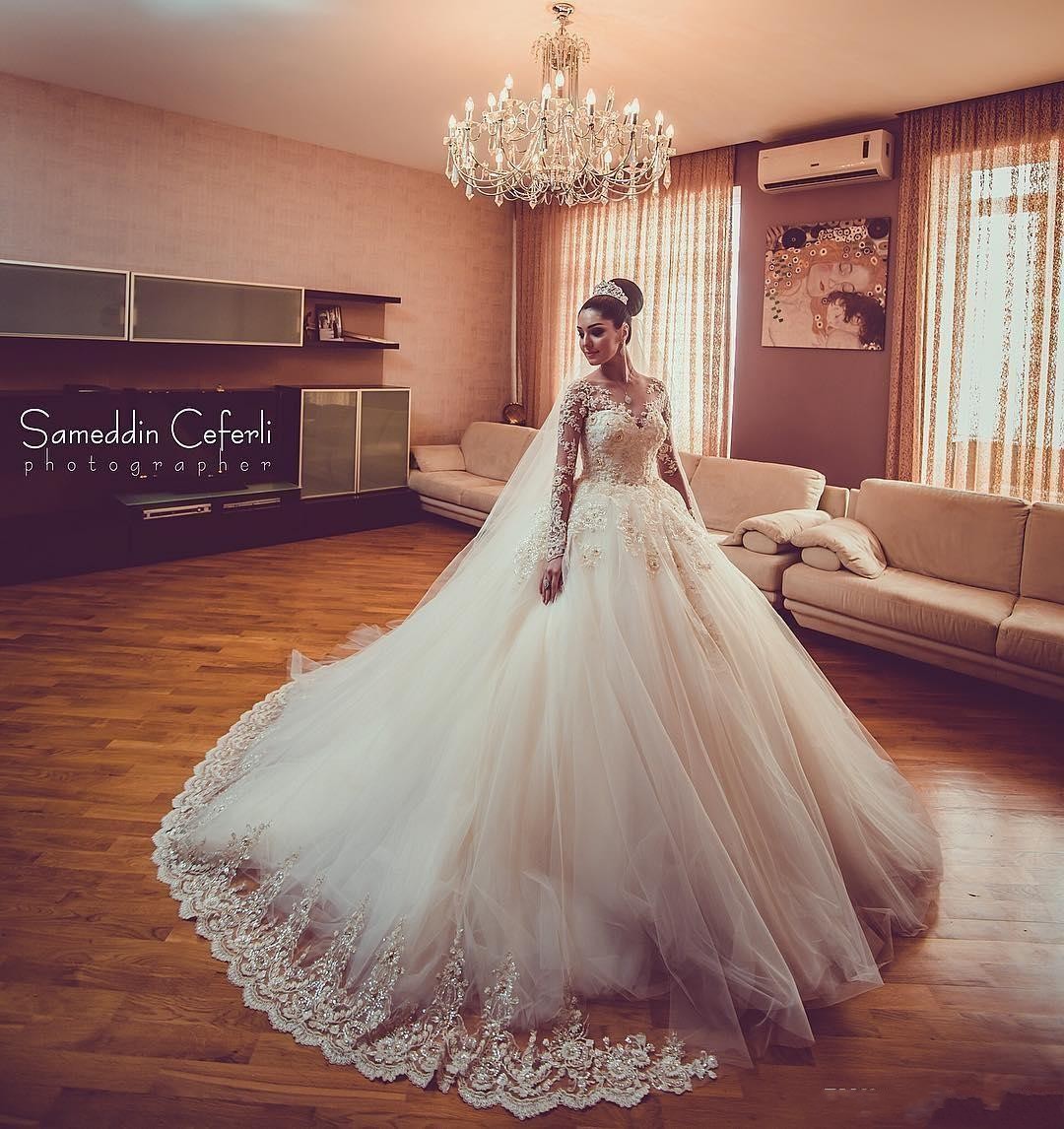 New Modern Sexy Arabic Long Sleeves A Line Wedding Dresses Illusion Lace Appliques Crystal Beaded Tulle Plus Size Formal Bridal Gowns