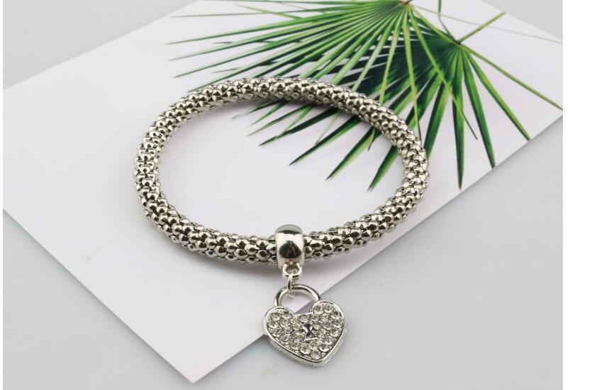 Alloy jewelry three - color stretch diamond love heart lock bracelet European and American women 's fast sell through three - piece