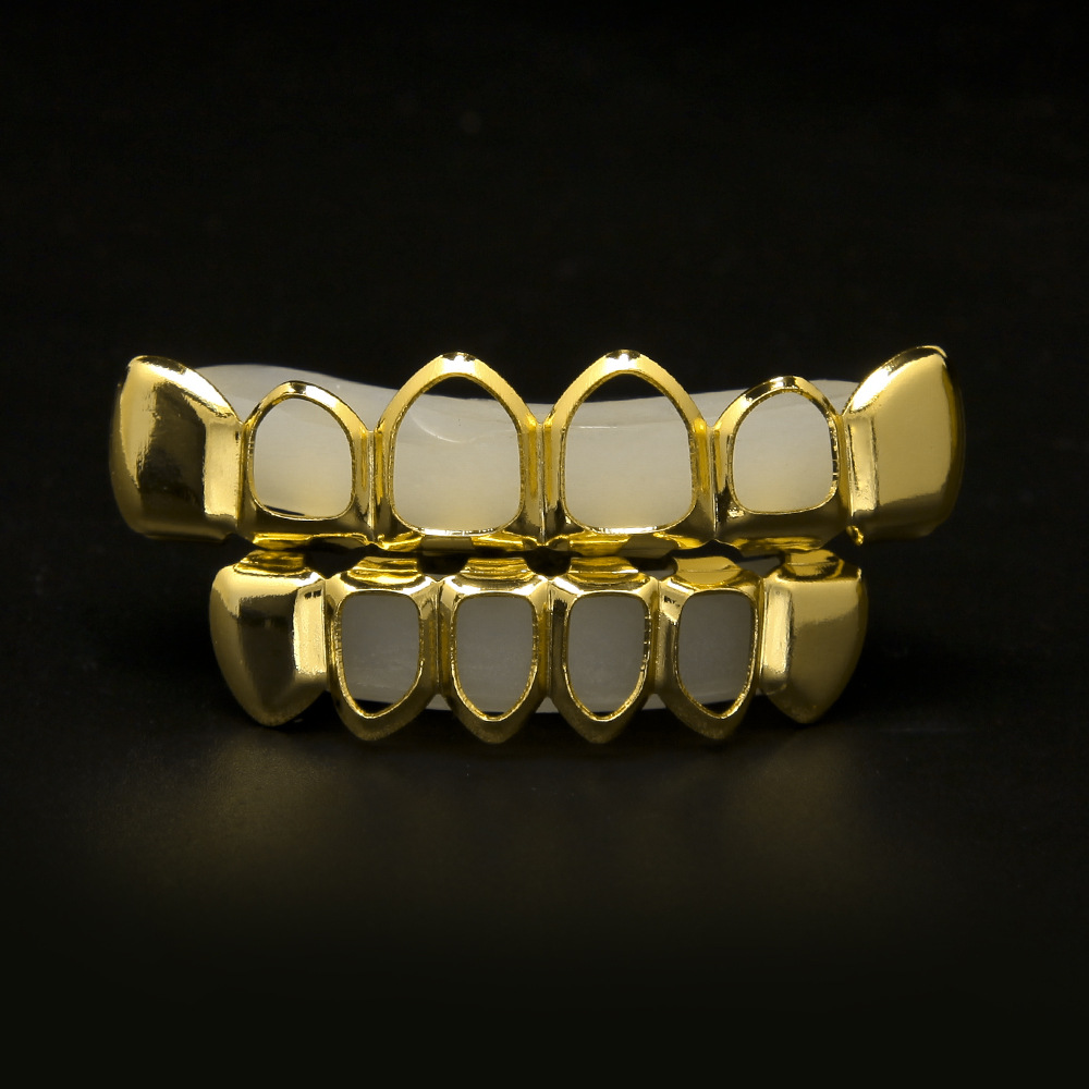 New 18k Real Gold Plated Iced out HipHop Hollow Teeth Grillz Top Grill Halloween Christmas Party Gift
New 18k Real Gold Plated Iced out HipHop Hollow Teeth Grillz Top Grill Halloween Christmas Party Gift