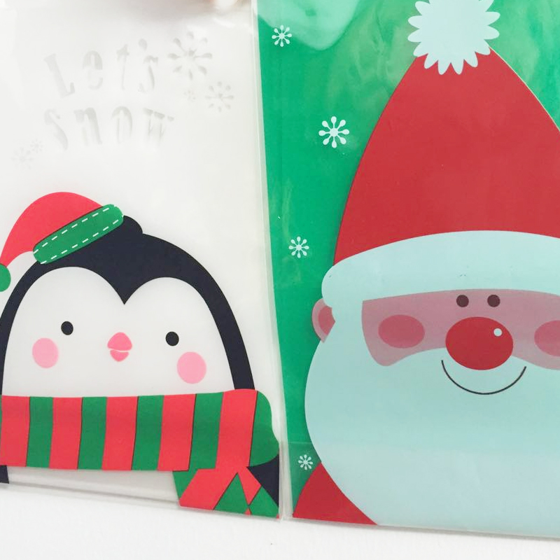 Wholesale-10Pcs Santa Claus Christmas Gift Treat Bags Plastic Cookies Biscuits Candy Packaging Bag Birthday Party Wedding Favor