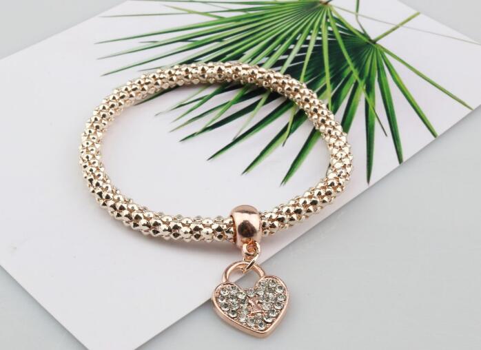 Alloy jewelry three - color stretch diamond love heart lock bracelet European and American women 's fast sell through three - piece