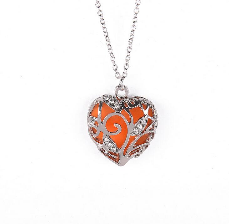 Free shipping 2017 new hollow luminous heart-shaped necklace luminous pendant female WFN149 (with chain) mix order 20 pieces a lot