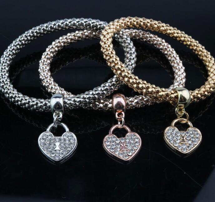 Alloy jewelry three - color stretch diamond love heart lock bracelet European and American women 's fast sell through three - piece