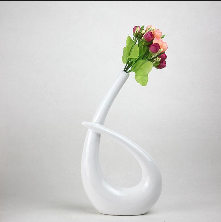 Modern Six Luchy Shape Ceramic Vase for Home Decor Tabletop Vase black and white colors
Modern Six Luchy Shape Ceramic Vase for Home Decor Tabletop Vase black and white colors