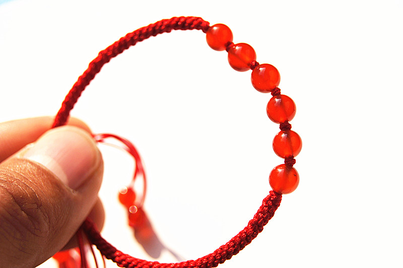 Hand catenary, pure manual weaving red knot + Hong Kong garden red agate beads bracelet.