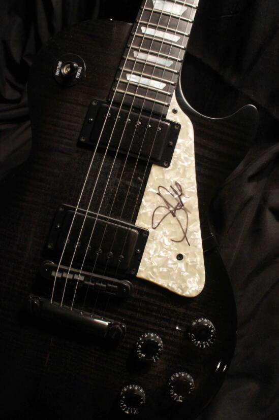 Custom Black Translucent Joe Perry Cadillac Figured Maple Top Electric Guitar Tiger Flame Maple Neck, White Pearl Pickguard, Black Hardware 
Custom Black Translucent Joe Perry Cadillac Figured Maple Top Electric Guitar Tiger Flame Maple Neck, White Pearl Pickguard, Black Hardware