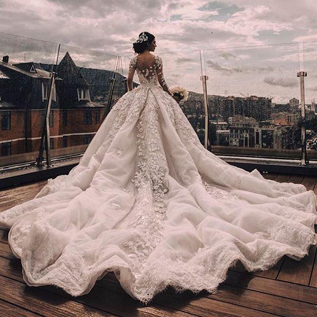 2018 Luxury Wedding Dresses Pearls Beaded Appliques Wedding Dresses Arabia Princess Royal Fabulous A Line Tulle Cathedral Train Bridal Gown