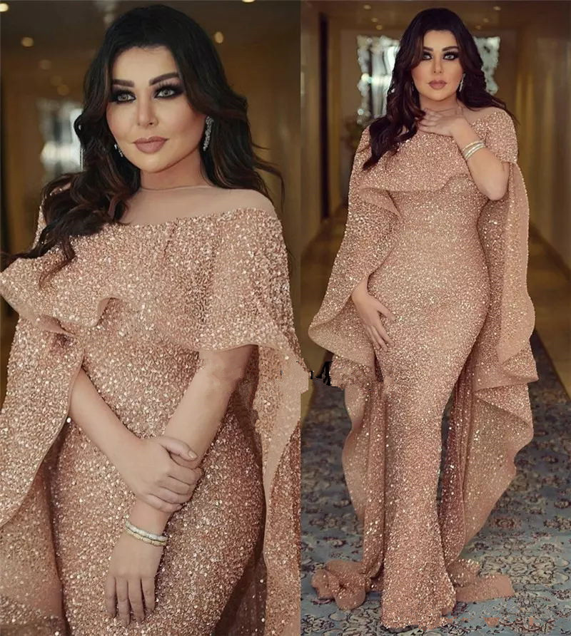 Rosa Gold Sequined Arabic Red Carpet Celebrity Dresses Yousef Aljasmi Back Split Plus Size Prom Gowns With Cape Mermaid Evening Dress, Gray
Rosa Gold Sequined Arabic Red Carpet Celebrity Dresses Yousef Aljasmi Back Split Plus Size Prom Gowns With Cape Mermaid Evening Dress, Gray
