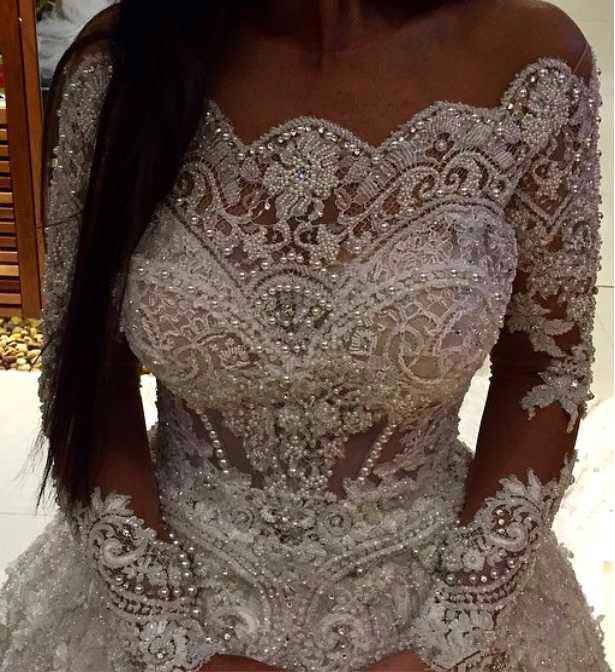 Elegant Winter Bateau Neck Sheer Long Sleeves Lace Ball Gown Wedding Dresses Beaded Pearls Chapel Train Wedding Bridal Gowns