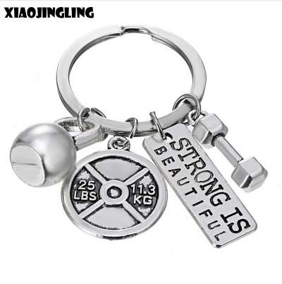 XIAOJINGLIG Personalized Barbell Dumbbell Keychain STRONG IS BEAUTIFUL Key Chain Men's Charm Women's Gym Sport Fashion Key Ring
XIAOJINGLIG Personalized Barbell Dumbbell Keychain STRONG IS BEAUTIFUL Key Chain Men's Charm Women's Gym Sport Fashion Key Ring